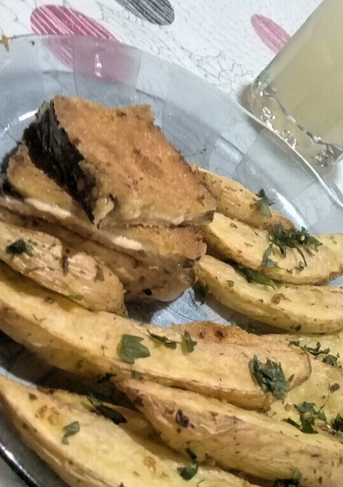 Una foto de Milanesa de berenjena rellena