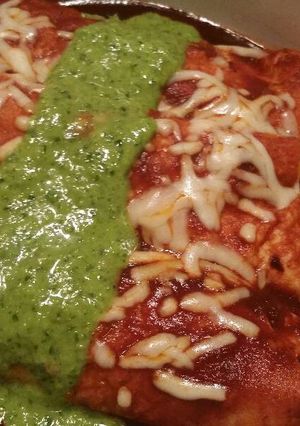 A picture of Queso Fresco Enchiladas w/ Red Sauce & Chimichurri.