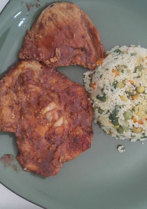 Una foto de Couscus con verduras y cerdo con  paprika