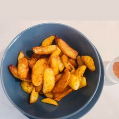 A picture of Shallow Fried Potatoes 🥔-Flavoured with Unique Spices 🍟.