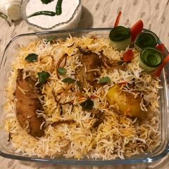 A picture of Chicken Dum Biryani (Kolkata style).
