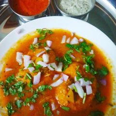 A picture of Sambar Vada.
