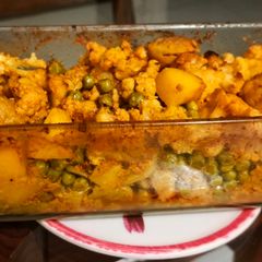 A picture of Steamed and Baked Vegetables with Spiced Yogurt.