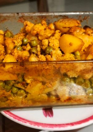 A picture of Steamed and Baked Vegetables with Spiced Yogurt.