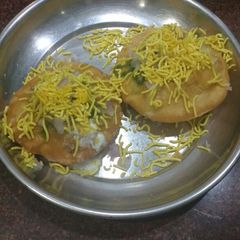 A picture of Moong daal and matar kachori.