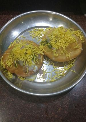 A picture of Moong daal and matar kachori.