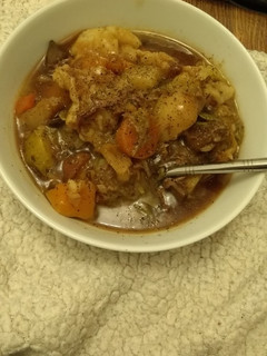 A picture of Mutton stew with homemade dumplings.