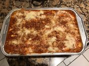 Una foto de lomo de cerdo con mozzarella