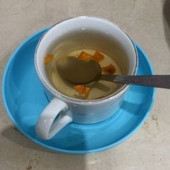 A picture of Dry orange peels drink 🍷.