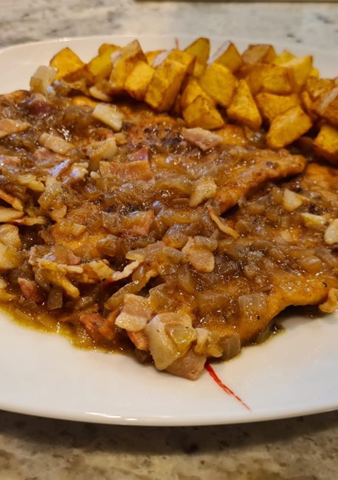 Una foto de Pechugas de pollo a la mostaza con salsa de cebolla