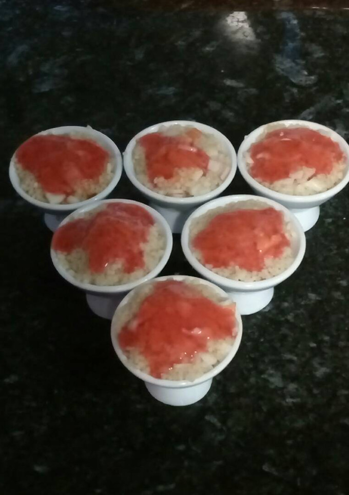 Una foto de Tapa de cuscus sabor a marisco y salsa agridulce
