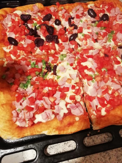 Una foto de Pizza