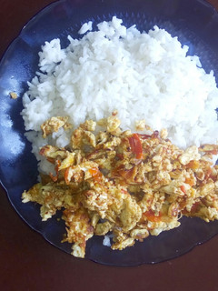 A picture of Fried eggs and rice.