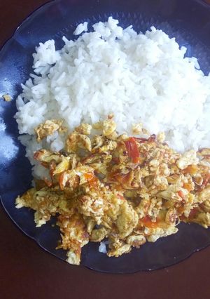 A picture of Fried eggs and rice.