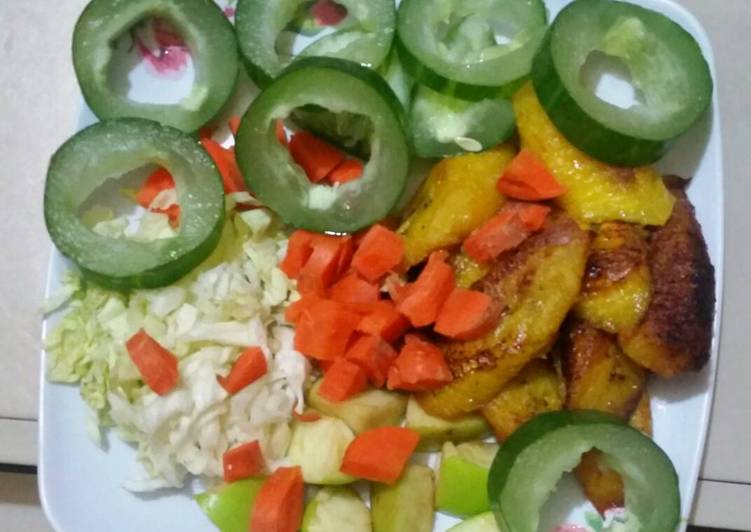 A mixture of fruit and fried plantain