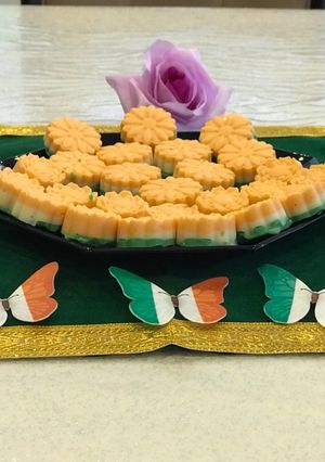 A picture of Tricolour chocolate with orange, pistachios and coconut flavour.