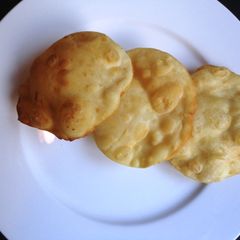 A picture of Poori (Deep Fried Indian Flatbread) पूरी.
