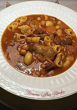 Foto principal de Sopa de tuetano con tomate y pasta