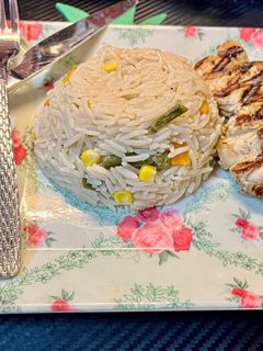 صورة لوصفة ارز بالخضار والذره دايت 🌽