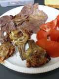 Filete de ternera con alcachofas y tomate