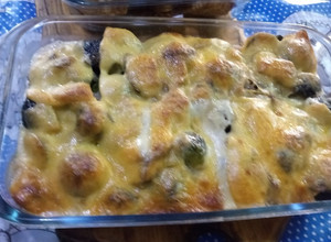 Una foto de Repollitos de Bruselas gratinados con crema y queso