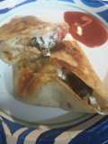 Leftovers: Lamb and Bean Burrito and a Puddle of Hot Sauce