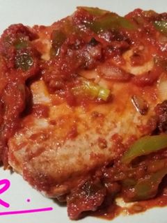 Una foto de Bonito con tomate