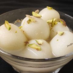 A picture of White Rasgulla OR Bangali Sweet.