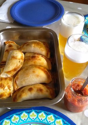 Una foto de Deliciosas Empanadas de merluza y algunos frutos de mar