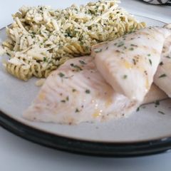 Creamy pesto pasta and basa A picture of Creamy pesto pasta and basa.