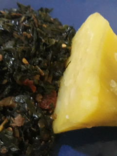 A picture of Sweet potatoes with vegetable sauce.