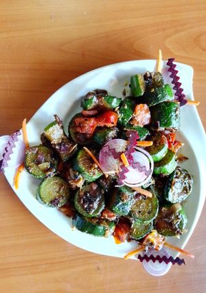 A picture of Zucchini pickle sabzi 🍅🧅.