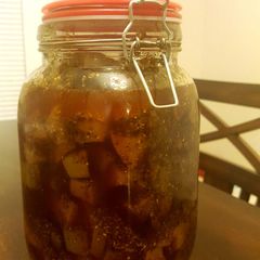 A picture of Aam Tel (Raw mango pickle in oil).