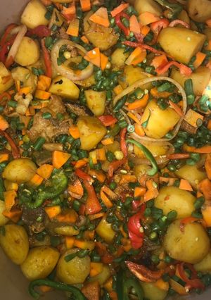 A picture of Garnished potatoes.