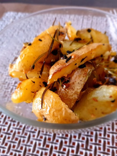 Una foto de Patatas al romero