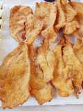 Cotoletta di pollo con salsa alle erbe aromatiche