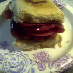 A picture of Hard Salami and Hotdogs on Cuban Bread.