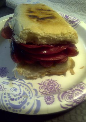 A picture of Hard Salami and Hotdogs on Cuban Bread.