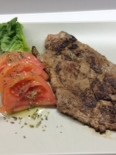 Una foto de Filetes de cerdo macerados en cilantro y lima