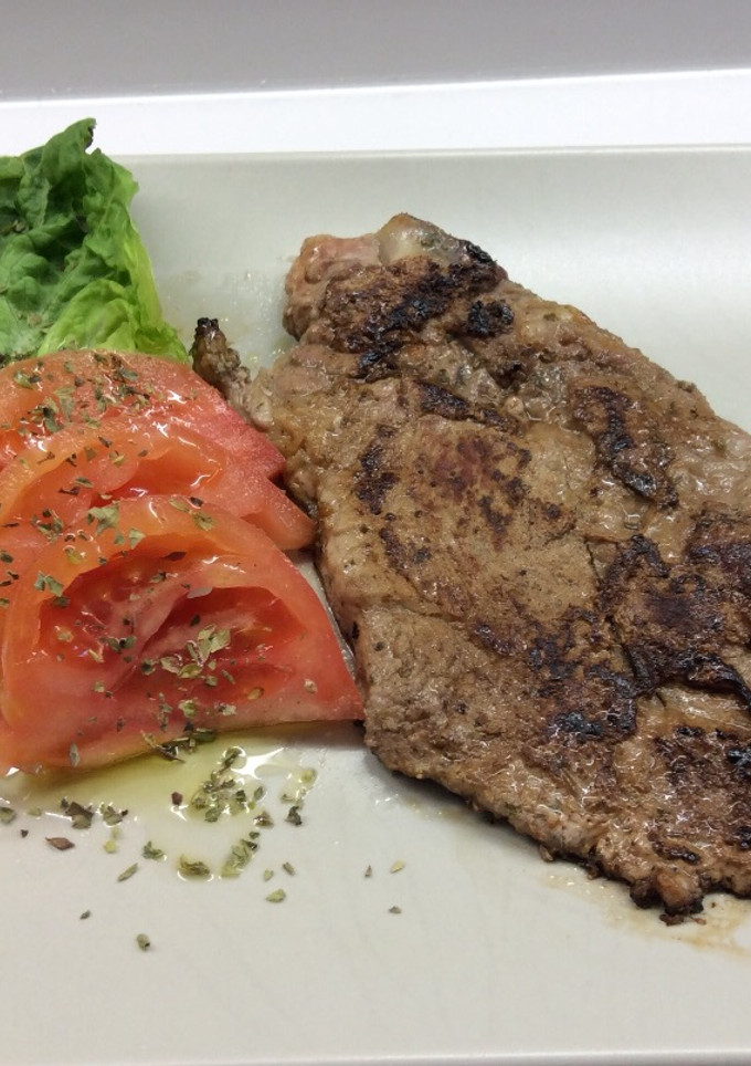 Una foto de Filetes de cerdo macerados en cilantro y lima