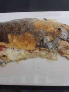 Una foto de Truchas al grill doble con jamón y queso