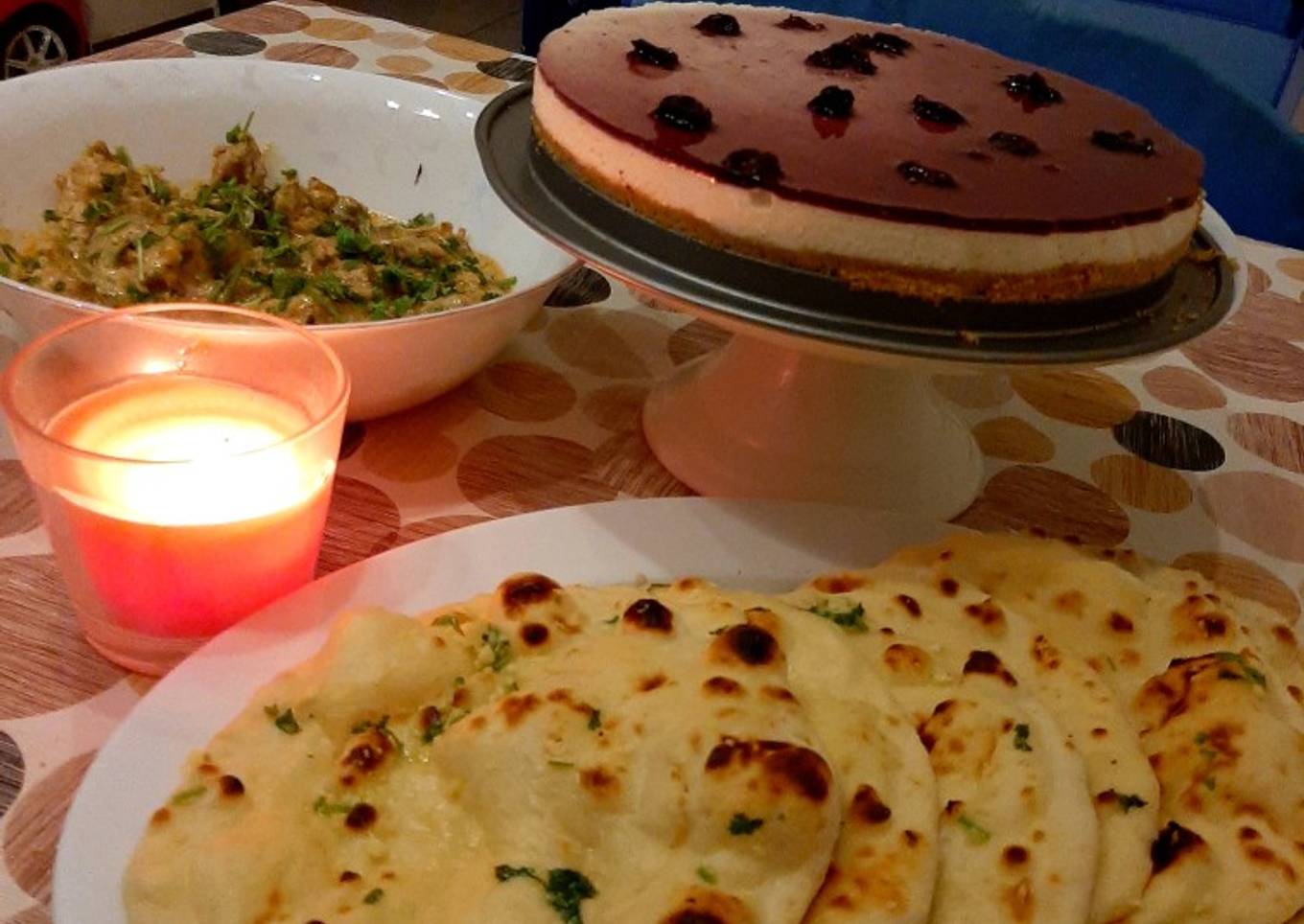 Tawa Naan with paneer handi and blueberry cheese cake