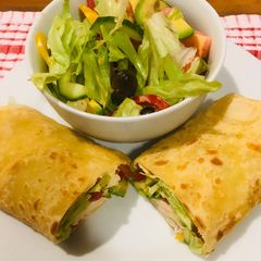 A picture of Roti serve with green salad.