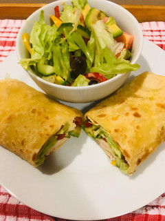 A picture of Roti serve with green salad.
