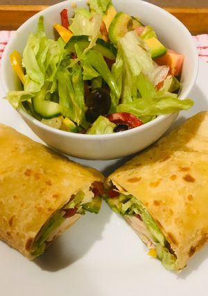 A picture of Roti serve with green salad.