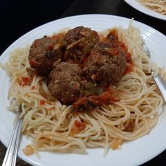 A picture of Spaghetti & Meat Balls in tomato sauce.