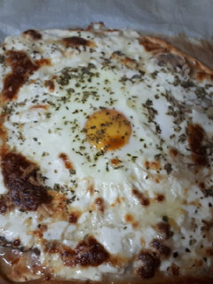 Una foto de Pizza carbonara