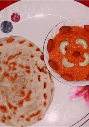 A picture of Lachha paratha and suji halwa.