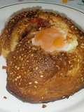 Huevos al nido gratinados