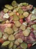 Porc mariné dans du jus de cornichon